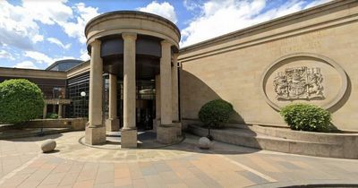 Armed masked men stormed Lanarkshire home and told terrified family 'shut up or I'll kill you'
