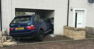 Joyriders plough BMW into house leaving mum and her three children homeless