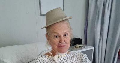 Kim Woodburn rushed to hospital with mystery illness as she shares snap from bed