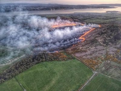 Fire crews battle overnight against huge blaze near Scottish reservoir