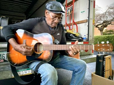 Kentucky folk singer collects instrument donations after tornado destruction