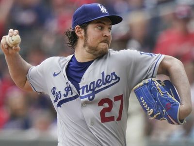 Los Angeles Dodgers pitcher Trevor Bauer is suspended over alleged sexual assault