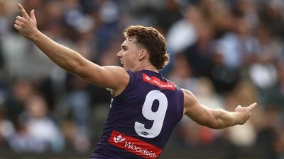 Fremantle beat Geelong by three points in thriller as Melbourne's winning streak stretches to 14