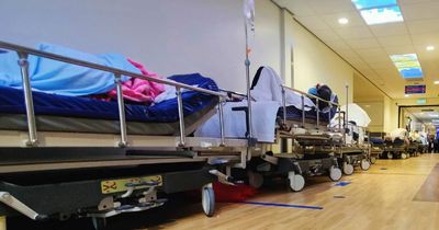 Beds line corridor as some patients wait 24 hours in struggling A&E