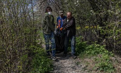 ‘Someone has to do it’: the volunteers exhuming Kyiv region’s dead
