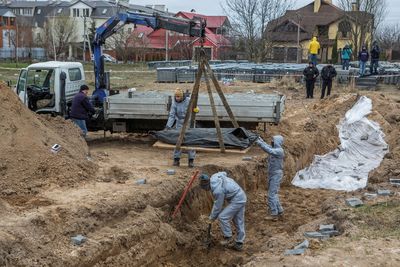 Kyiv police find three bound men they say were executed by Russian occupiers