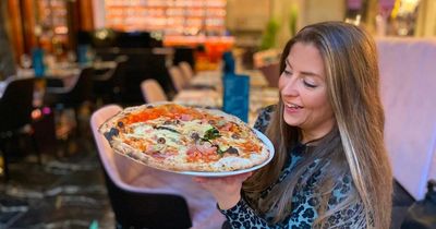 "I ate 'the world's best pizza' in Manchester surrounded by bling and hot pink neon lights... it was an education"