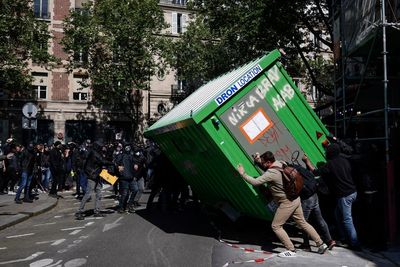 Violence erupts in Paris as May Day protesters demonstrate against Macron