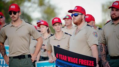 Darwin prison officers allege 'under-staffing and overcrowding' during wage freeze protest on May Day