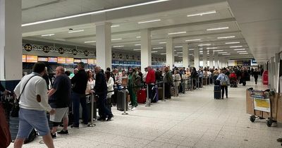 Manchester Airport passengers forced to queue out the door in 'crazy' scenes this morning