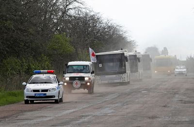 Ukraine evacuees flee to safety after ordeal in Mariupol steel works