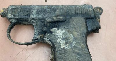 Handgun and knuckleduster among weapons pulled from Scots canal by magnet fishers