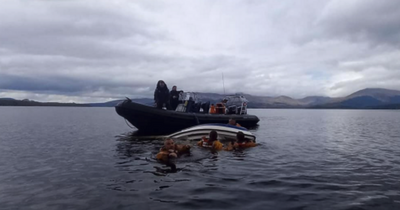 Loch Lomond rescue as three plucked from water after boat capsizes