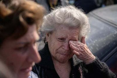 Civilians fleeing besieged Mariupol describe weeks of bombardment