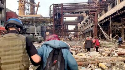 Ukraine fighter says civilians remain trapped in Mariupol steel works