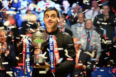 Ronnie O’Sullivan wraps up a seventh world championship title after fighting off Judd Trump comeback