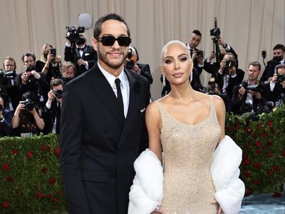 Pete Davidson helps Kim Kardashian up Met Gala steps as she struggles in Marilyn Monroe’s dress