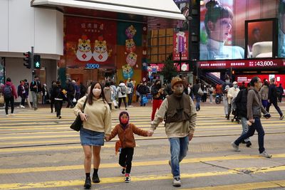 Hong Kong to further ease COVID curbs, bars to stay open until 2 a.m