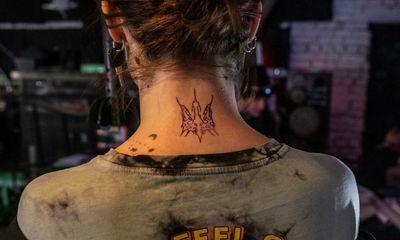 ‘It symbolises resistance’: Ukrainians get tattoos to back war effort