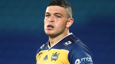 Ash Taylor announces NRL retirement at 27, saying he 'couldn't stand up to play with my children'