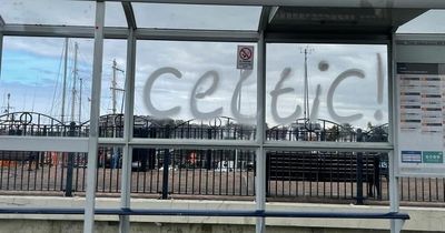 Boozed-up Celtic yobs run amok in Ayrshire town as supporters plaster ultras graffiti on church