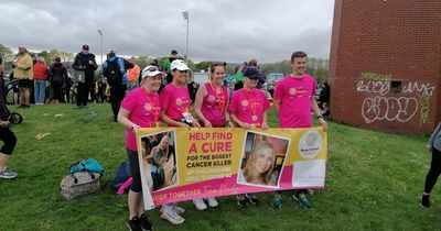 Derry school staff run marathon in memory of two young mums