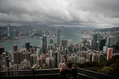 Hong Kong economy shrinks 4% under anti-virus controls
