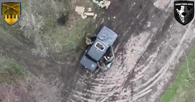 Incredible moment Ukrainian drone bomb flies through the sunroof of Russian vehicle