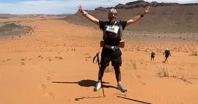 Dad loses 'chunks of feet' running six marathons in six days through 50C desert heat - to prove he was a better runner than his wife