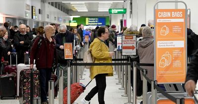 'An absolute shambles!' Manchester Airport passengers wait up to 90 minutes for Security - after long check-in queues