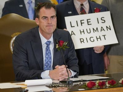 Oklahoma governor signs Texas-style abortion ban into law