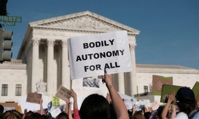 Tears and tension as protesters swarm outside US supreme court