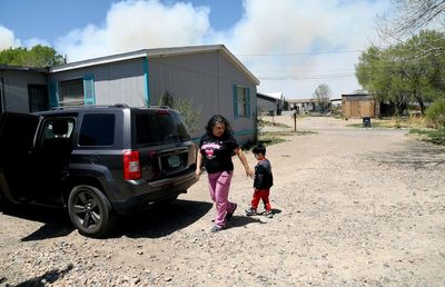 Residents wary as fire burns near northeast New Mexico town