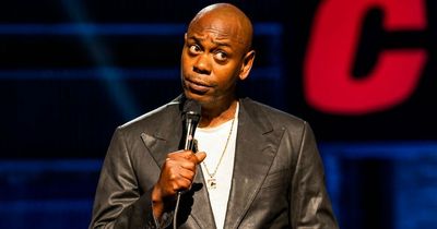 Dave Chappelle attacked on stage by man with gun as Chris Rock jokes: 'Was that Will Smith?'