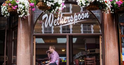 Shares in Wetherspoon drop as pub giant issues warnings