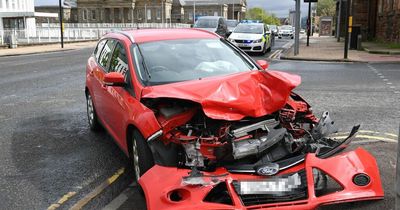 Police in Lanarkshire remain at the scene following early morning two car smash