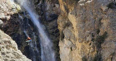 Mystery of missing hiker found dead down 80ft waterfall after cries for help heard