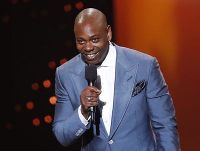 US comedian Dave Chappelle tackled on stage