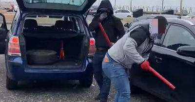 Horror moment dad is threatened by car thieves armed with baseball bats