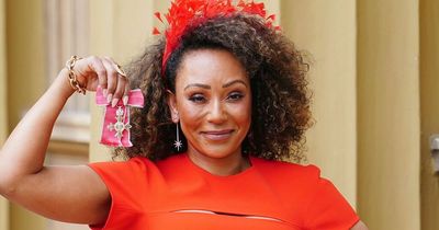 Mel B stuns in red as she collects MBE in dress designed by 'honoured' Victoria Beckham