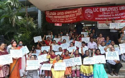 Staff members in all eight divisions of LIC protest