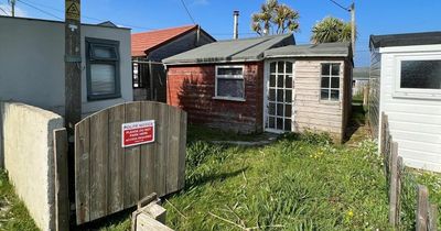 Tiny two-bedside seaside chalet with NO inside toilet on market for £325,000
