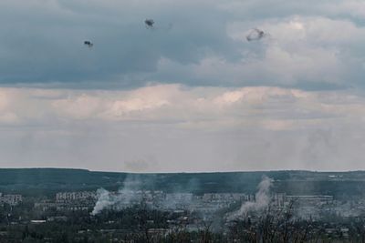 In east Ukraine, the war-weary listen out to stay alive