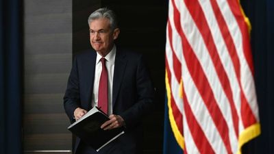 Federal Reserve hikes official interest rates by 0.5 per cent, ASX rises, Dow Jones jumps 900 points