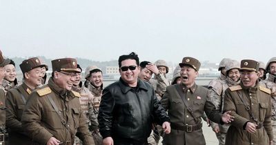 North Korea bans tight pants and trendy haircuts as fashion cops launch crackdown