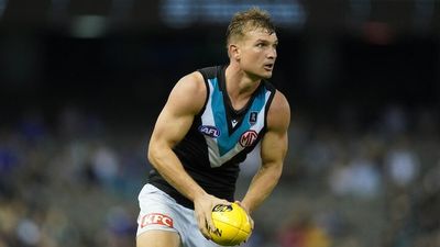 Adelaide Crows coach Matthew Nicks contracts COVID, Port Adelaide's Ollie Wines attacked by 'a thousand anti-vaxxers'