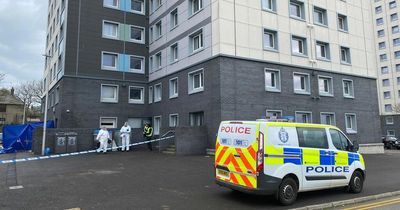 Body of woman found at Scots high-rise flats as forensic officers race to scene