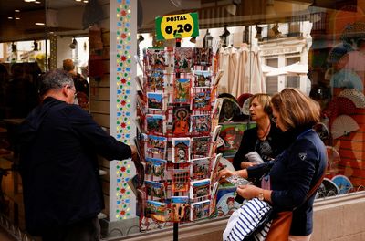 Spain's tourist arrivals jump 8-fold in March, edge toward pre-COVID levels