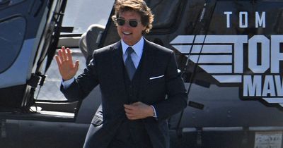 Tom Cruise casually arrives at the world premiere of Top Gun in a Maverick helicopter