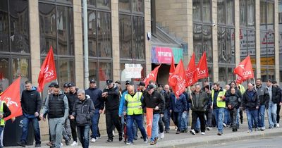 Striking workers march on council HQ as residents go to polls